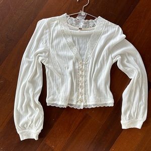 Free people white lace blouse. Button down or open. Flowing large but cropped.